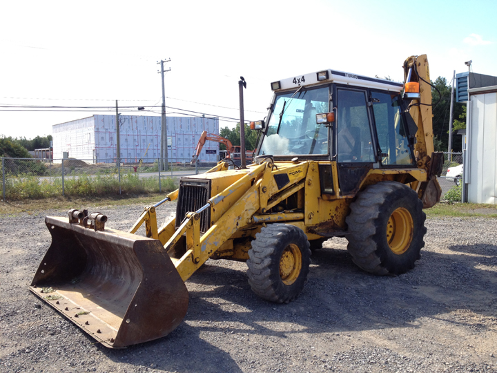 экскаватор-погрузчик JCB 1400